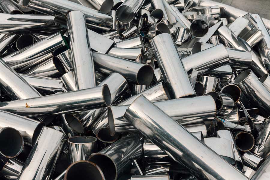 scrap metal parts representing supply chain waste